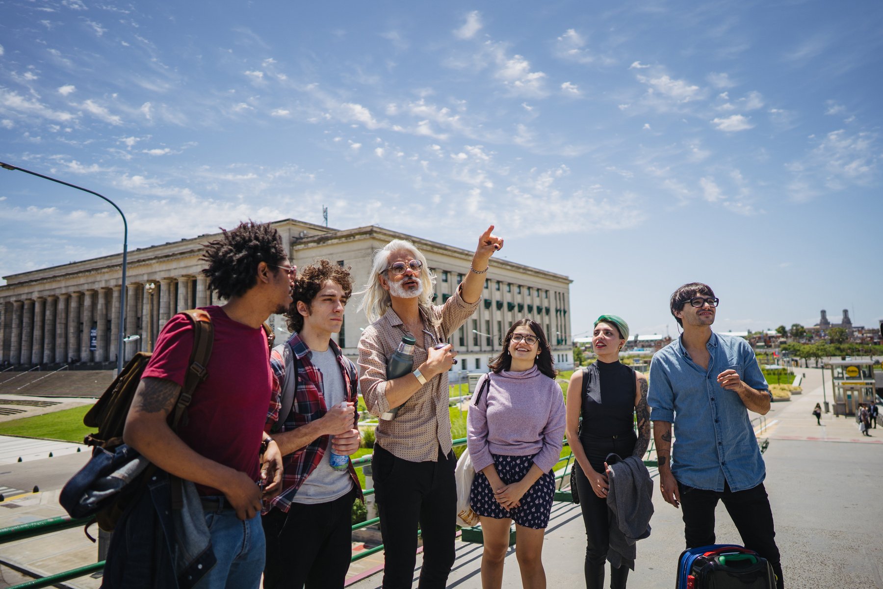 Professor in a campus tour with new students